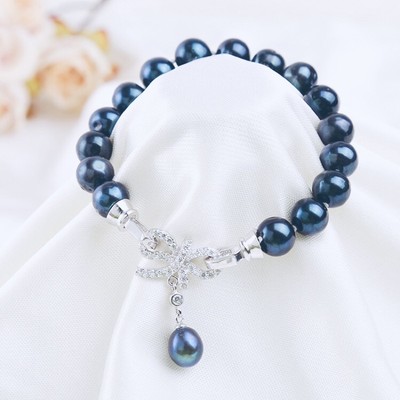 Vòng Tay Ngọc Trai Hạt 7-8ly Màu Đen Ánh Xanh Khóa Nơ - Ngọc Trai Trường Thịnh
