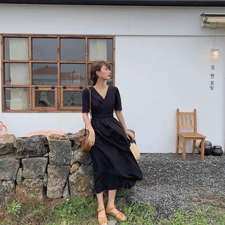 Đầm midi đen đắp chéo hở v đan lưng
