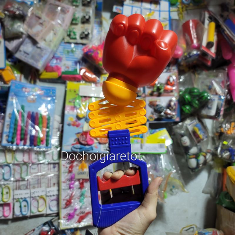 Đồ chơi tay đấm robot lò xo dùng cơ tay bóp