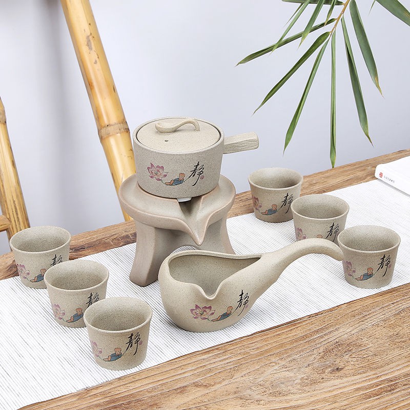 Máy xay đá sáng tạo bán tự động lười chạy khi xoay bộ trà Kung Fu tea infuser, đồ gốm gia dụng