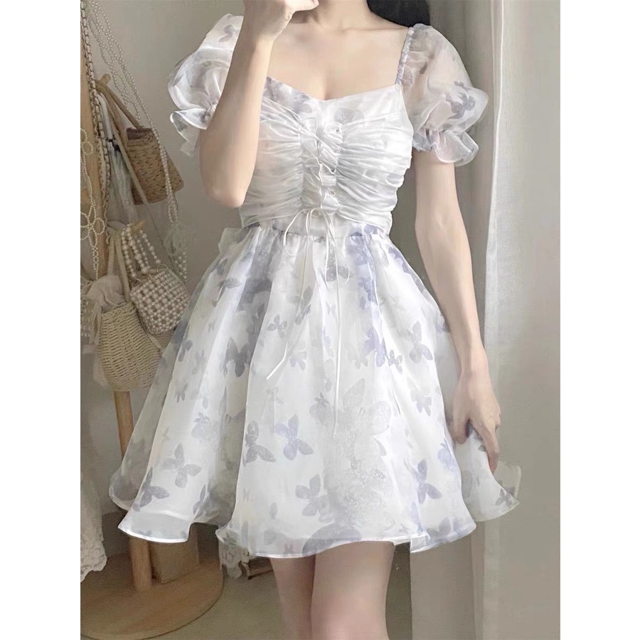 Đầm xinh đi tiệc, dạo phố hoa in nỗi thắt nơ sau