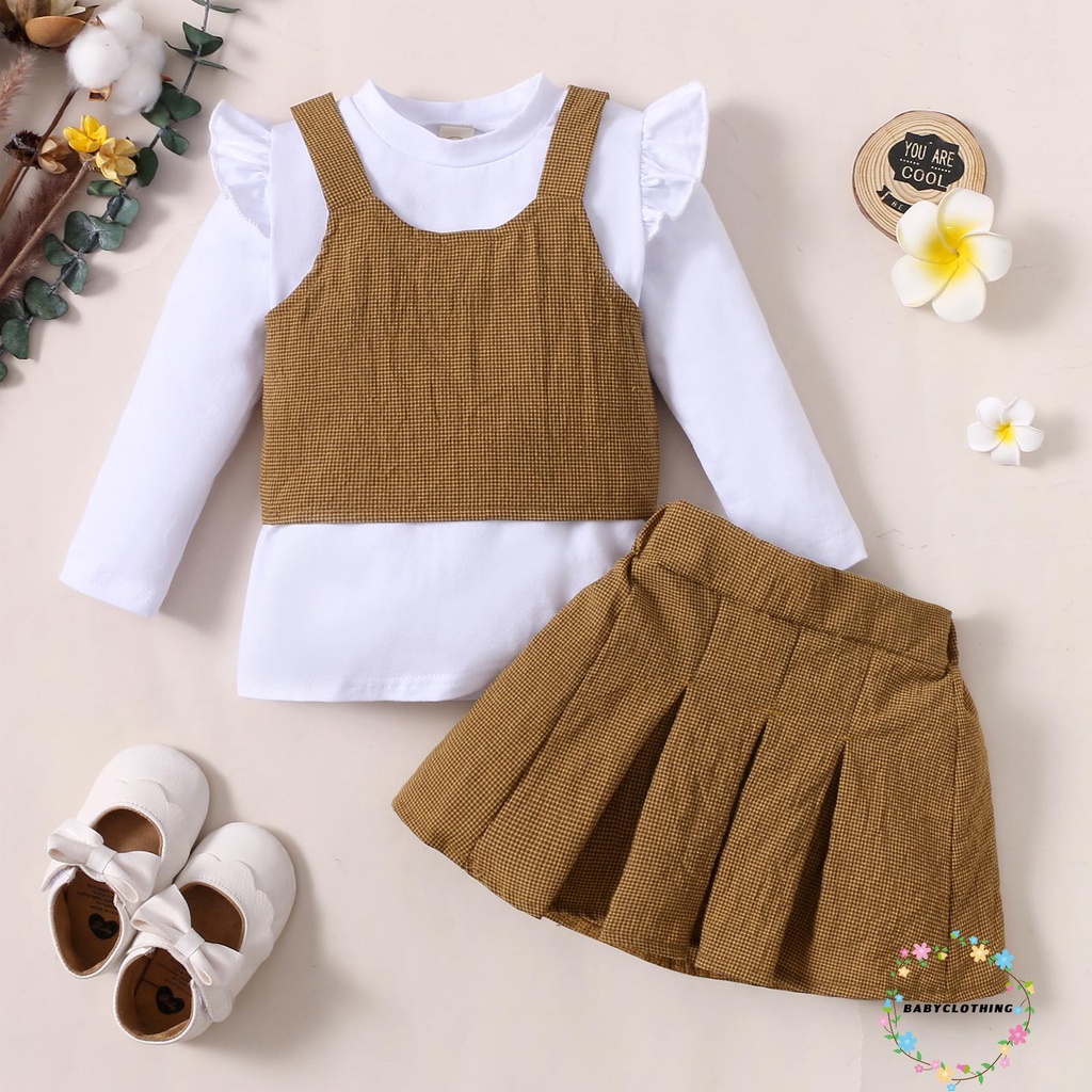 Bộ trang phục 3 món áo chui đầu cổ tròn tay áo bay màu trơn + váy kẻ sọc xếp ly cho bé gái