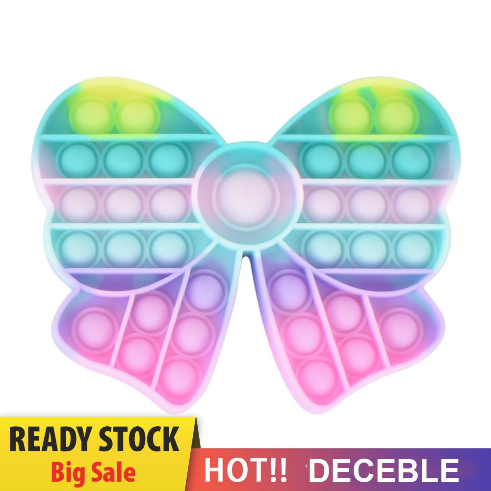 Đồ chơi bóng nhấn hình nơ màu cầu vồng macaron độc đáo