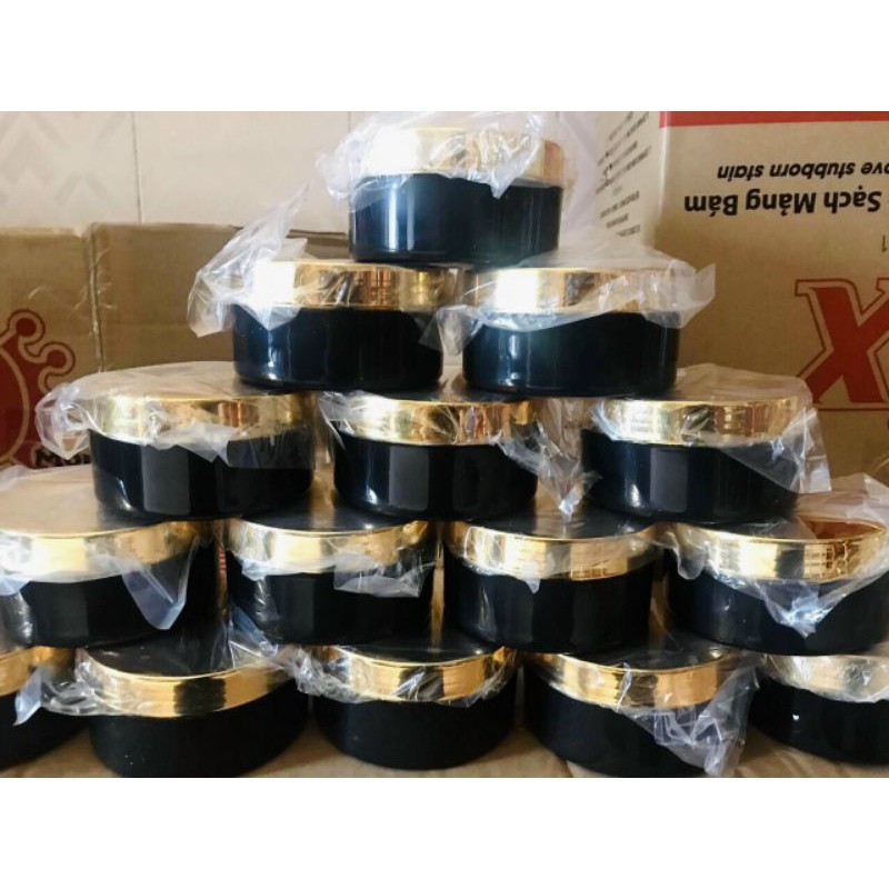 HỦ 200G THÂN ĐEN NẮP XI VÀNG