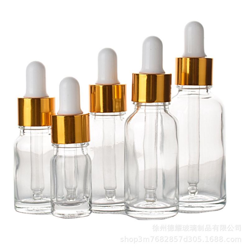 Vỏ chai thủy tinh, tinh dầu , chai serum trắng trong khoen vàng ống thủy tinh : 5ml, 10ml, 15ml, 20ml, 30ml, 50ml, 100ml