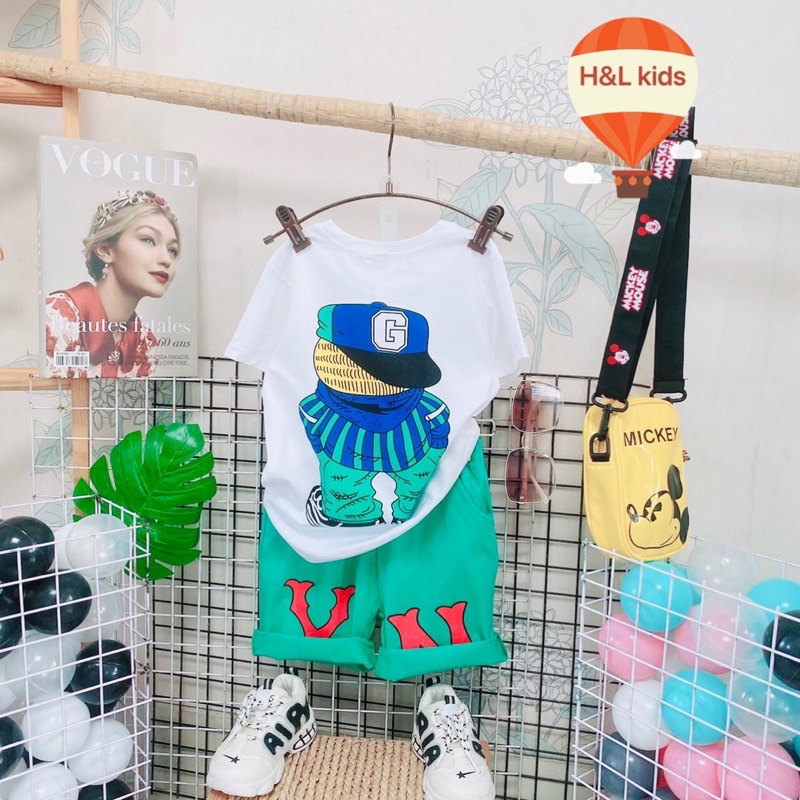 Bộ bé trai mèo Garfield áo in trước sau còn size 11,12