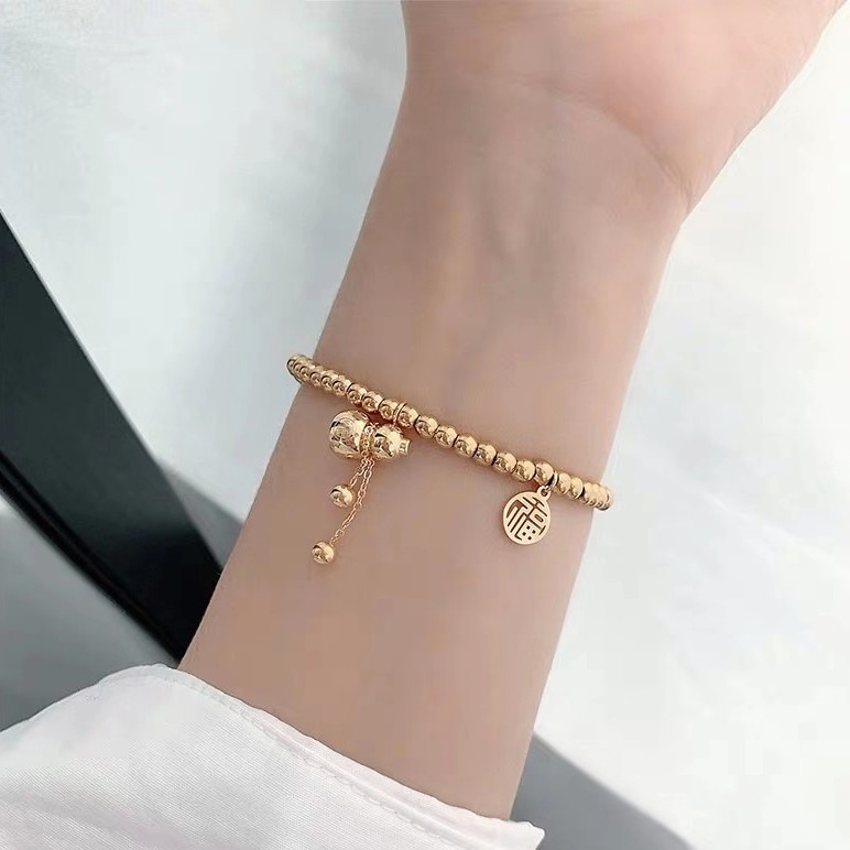 Vòng Đeo Tay May Mắn Bằng Thép Titanium Mạ Vàng Hồng 18K Mặt Hình Quả Bầu Phối Dây Co Giãn