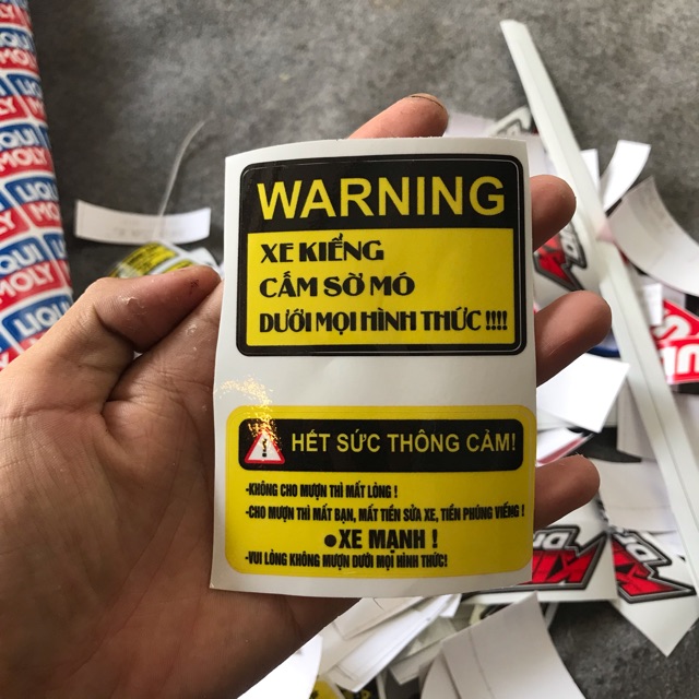 tem miếng cảnh báo  dán  xe