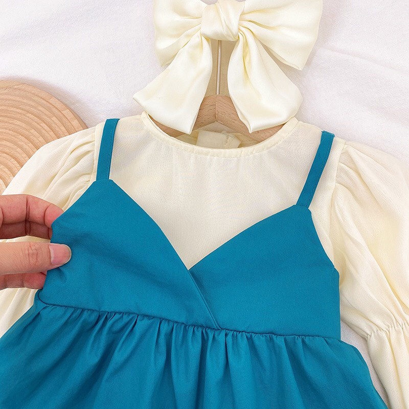Váy bé gái dài tay dây yếm liền áo trắng nơ lưng 2 mầu Xanh Vàng 8-35kg XHN1057