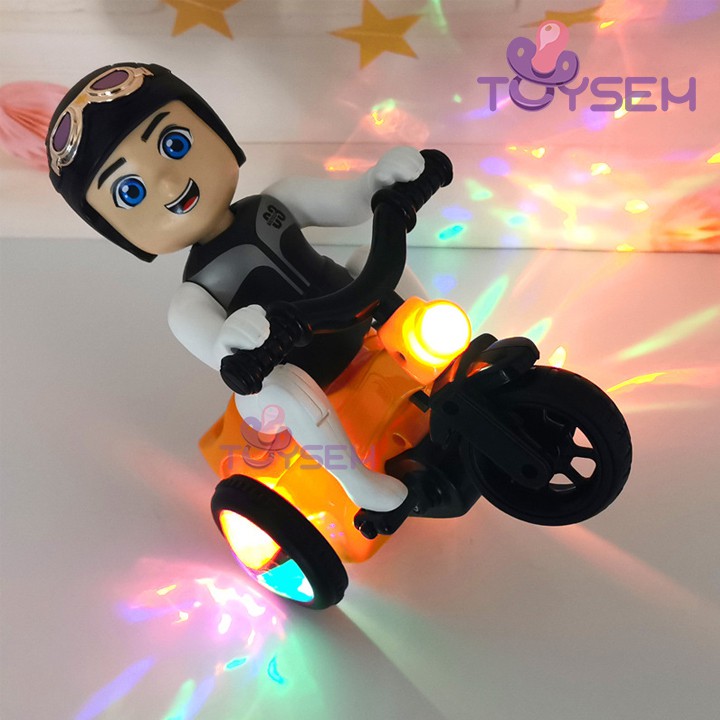 Xe đồ chơi trẻ em bé đi xe đạp xoay 360 độ Toysem có nhạc và đèn sáng 3 màu - Quà tặng sinh nhật, thôi nôi cho bé