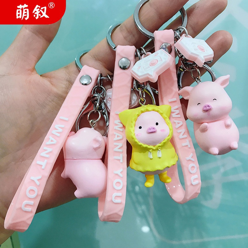 Hoạt Hình Móc Khóa Nhựa Hình Chú Heo Mặc Áo Mưa Dễ Thương