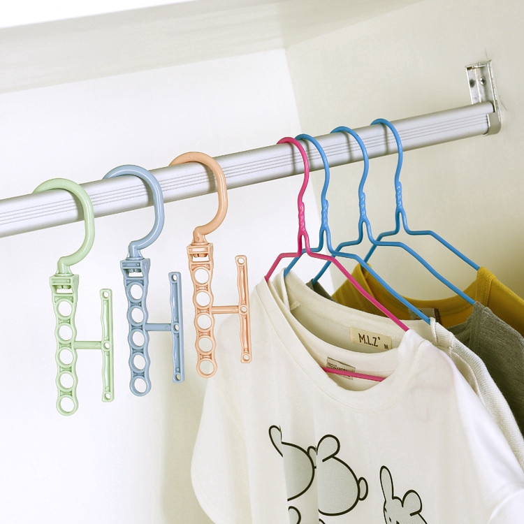 Multifunctional five-hole hanger with handle that can be rotated 360 degrees to complete the hanger