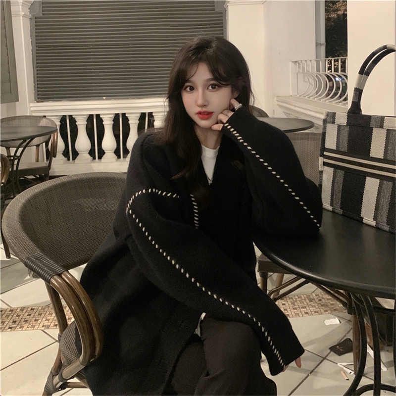 Áo khoác cardigan hoạ tiết nhẹ nhàng