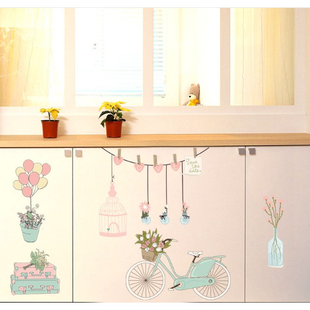Decal trang trí tường Xe đạp và chậu hoa Màu dịu dàng