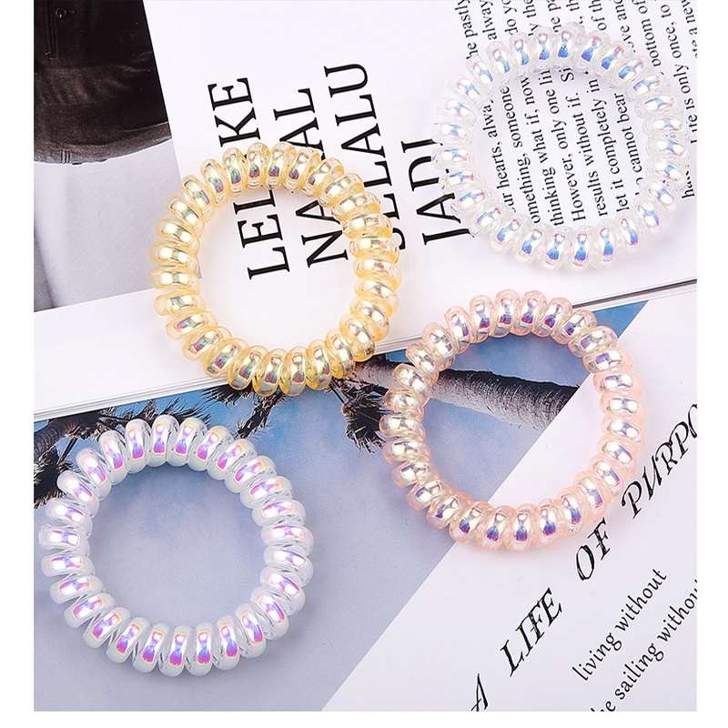 Dây buộc tóc nhựa xinh xắn dạng lò xo xoắn trong suốt Hologram Dc000995