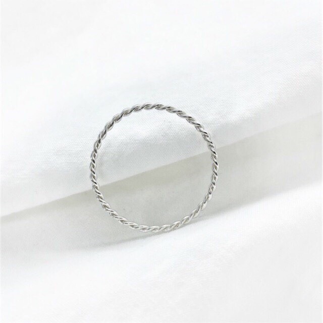 Nhẫn nữ bạc thật mẫu vặn xoắn nhỏ xinh cá tính - Kho sỉ bạc Nhất Linh