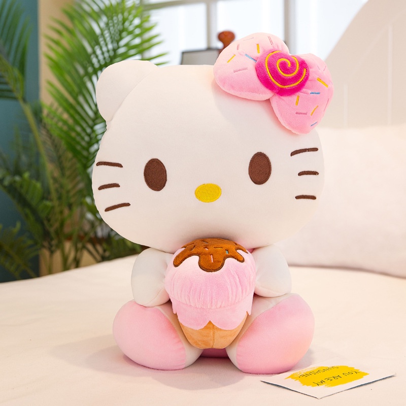 Gấu bông Hello Kitty ôm bánh đeo nơ dễ thương cho bé kích thước 30-40-50cm NEOCI