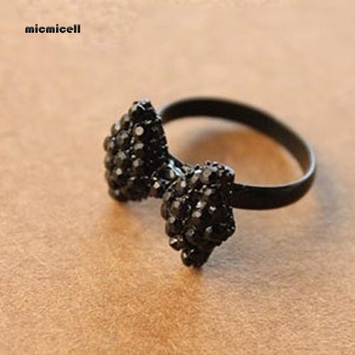 Nhẫn đeo tay kim loại hình nơ màu đen đính đá độc đáo
