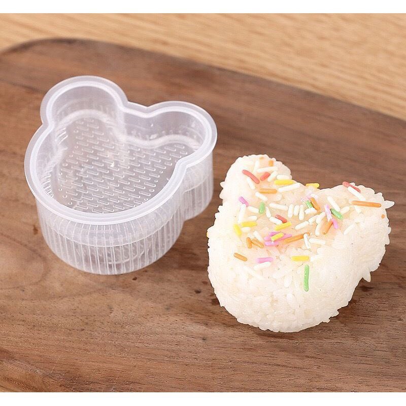 Khuôn làm cơm, khuôn ép cơm Onigiri màu trắng giúp bé ăn ngon miệng.
