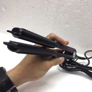 Máy là tóc bản cong