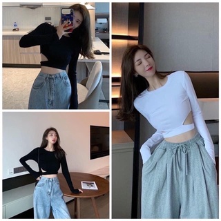 Áo kiểu thun croptop tay dài cổ tròn phối hở eo