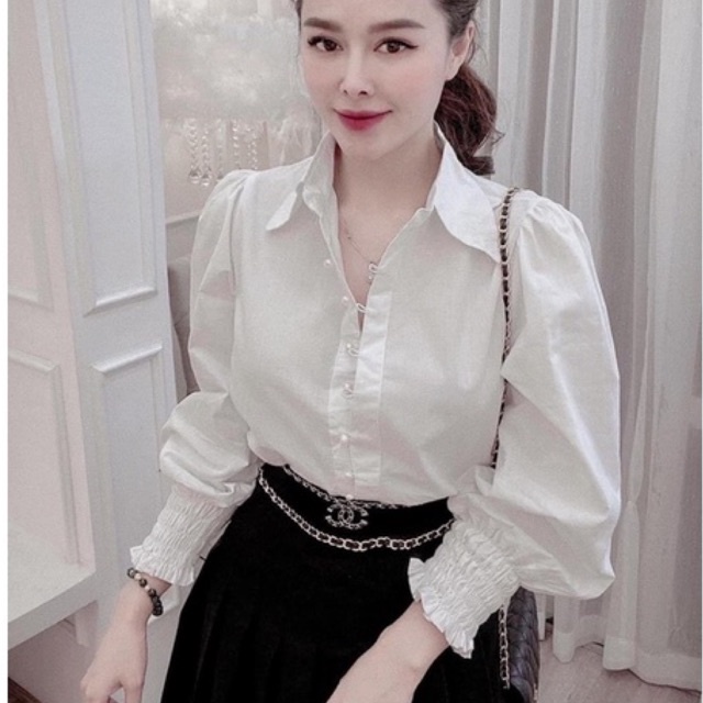 Áo sơ mi trắng tay bồng cúc ngọc