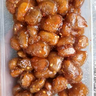 Mứt chôm chôm chua cay