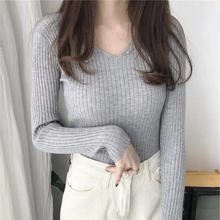 Áo len gân cổ tim