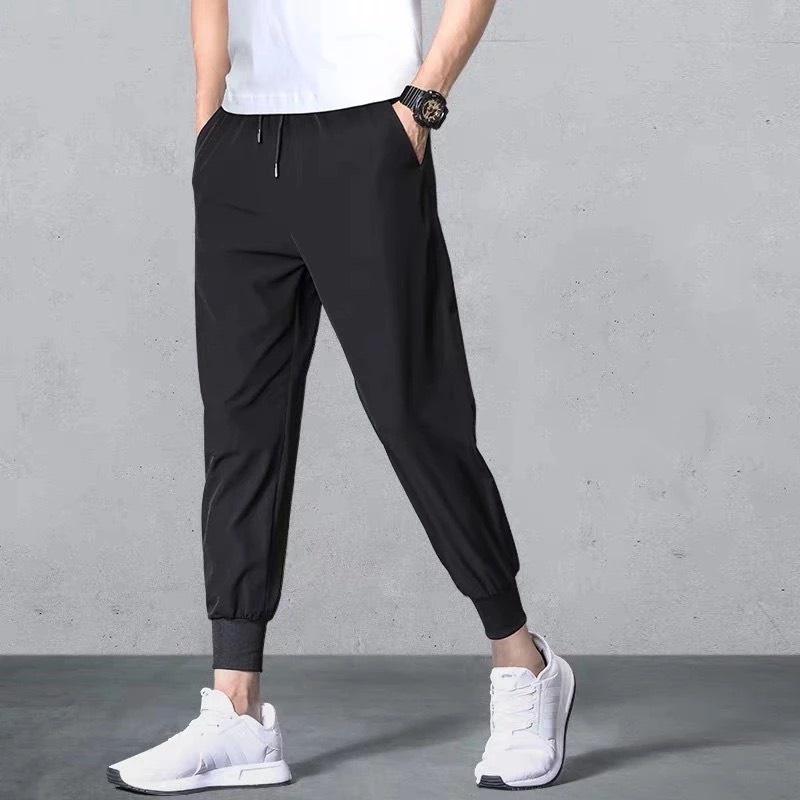 ( QT kẹo alpenliebe)Quần Jogger Nam Nữ Trơn Basic Thun Poly Phong Cách Thể Thao Năng Động Cá Tính