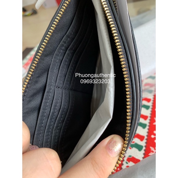 Ví cầm tay Coach logo signature canvas AUTHENTIC