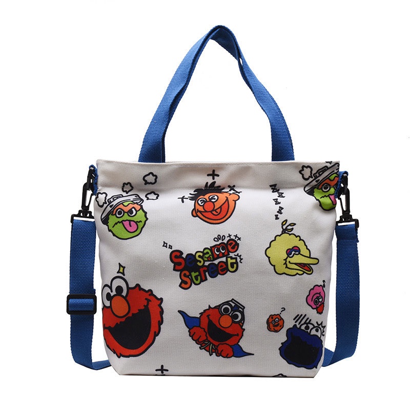 Túi đeo chéo YADOU bằng vải canvas hình Sesame Street đáng yêu phong cách đơn giản thời trang nghệ thuật cho nữ sinh
