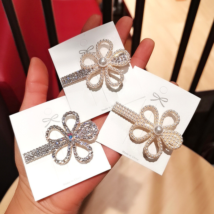 Kẹp tóc đính ngọc trai nhân tạo hình bông hoa xinh xắn cho nữ