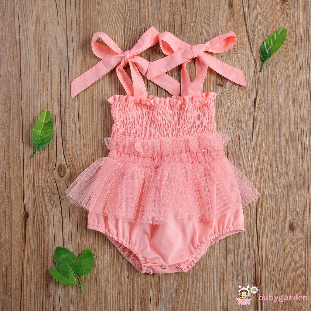 Áo liền quần đính nơ hợp thời trang cho bé gái