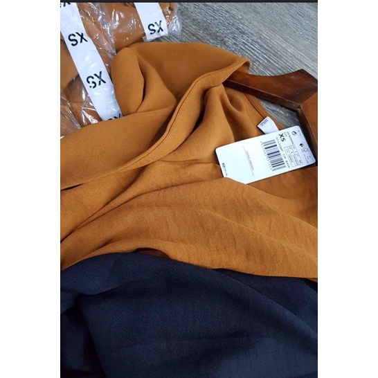 Đầm Mangoo vạt chéo