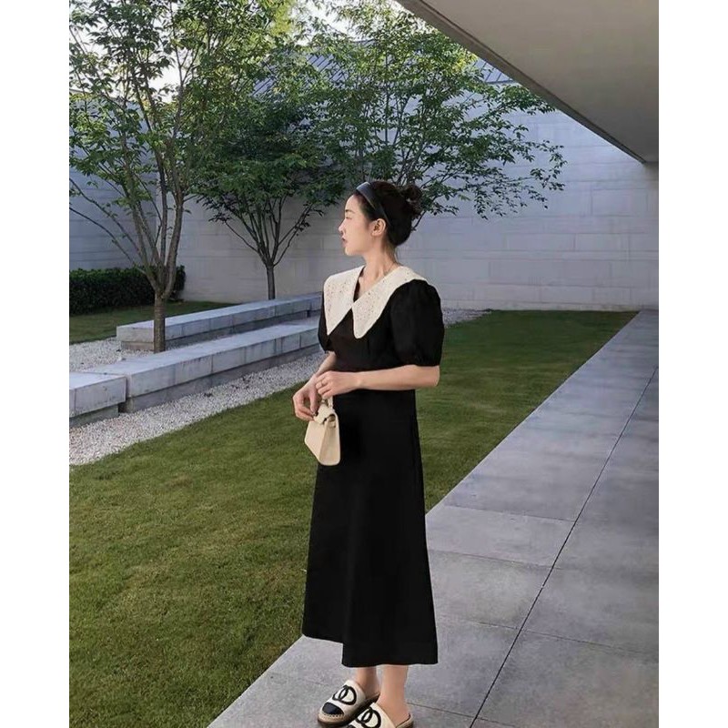 Đầm đen cổ sen ren trắng