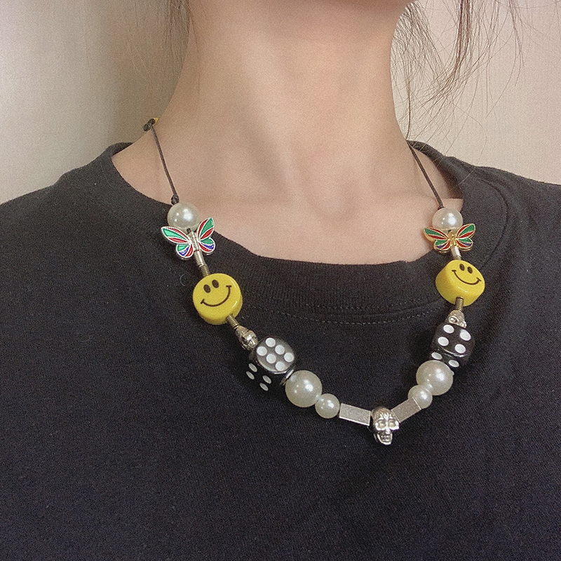 Dây chuyền xâu ngọc trai nhân tạo mặt cười mặt xúc xắc đầu lâu hợp thời trang