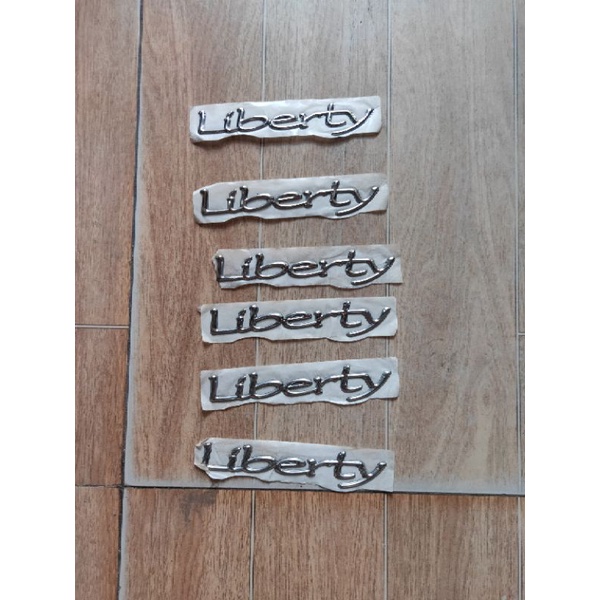 Tem chữ vespa, liberty, fly