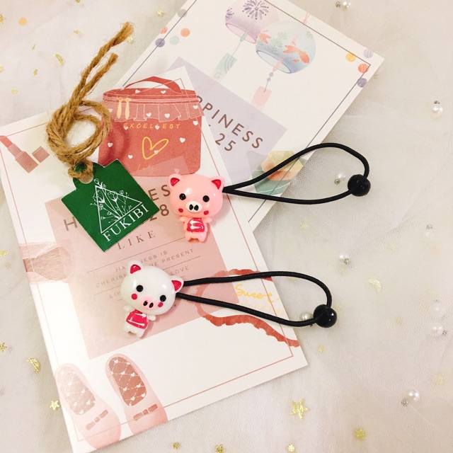 CỘT TÓC BÉ HEO ĐÁNG YÊU ẢNH THẬT