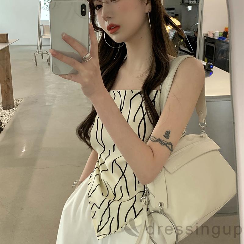 Áo hai dây cổ thuyền không tay hở lưng màu be đuôi áo không đều cho nữ | BigBuy360 - bigbuy360.vn