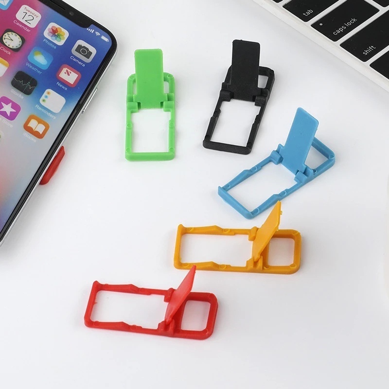 Giá Đỡ Điện Thoại Để Bàn Mini Bằng Nhựa Nhiều Màu Sắc Có Thể Gập Lại
