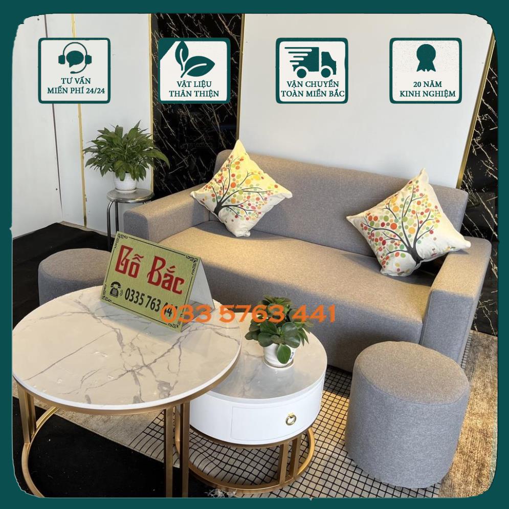 GIÁ GỐC - Chọn bộ ghế sofa khung gỗ tự nhiên bọc nỉ nhung màu sắc tùy chọn, có kèm bàn trà trắng tròn chân gỗ