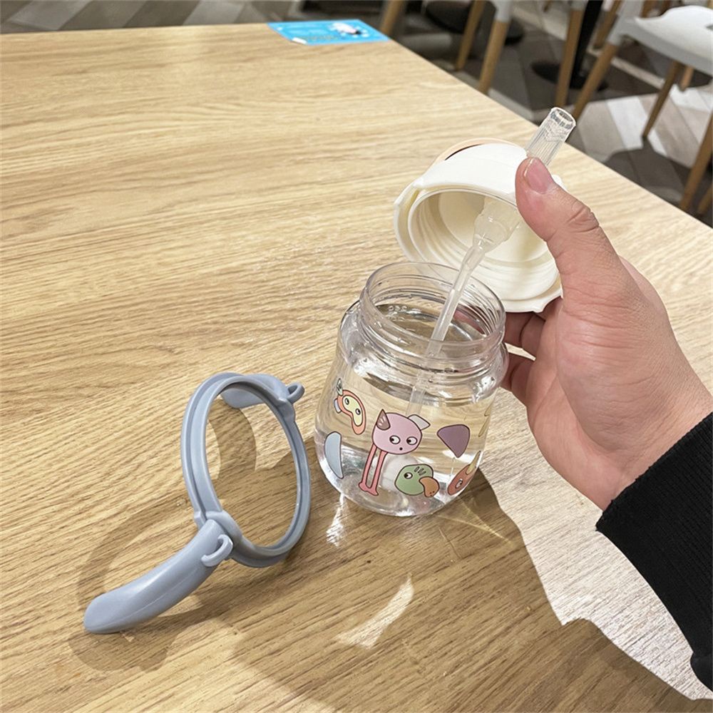Bình uống nước 280ml có tay cầm và ống hút chống tràn họa tiết hoạt hình cho bé