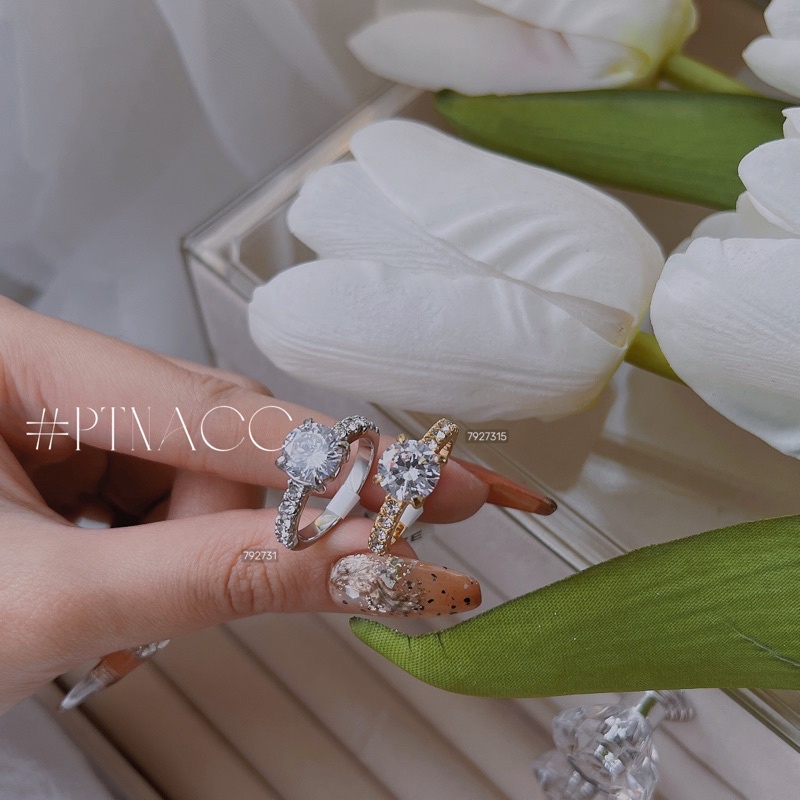 Nhẫn titan hột cao đơn giản, nhẫn nữ đính đá không đen .PTNACC.