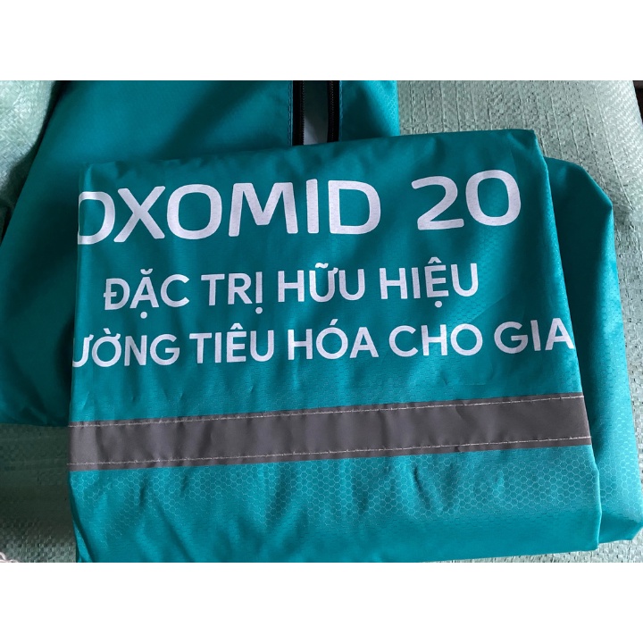 Áo mưa cánh dơi vài da cá cao cấp màu xanh ngọc có túi đựng