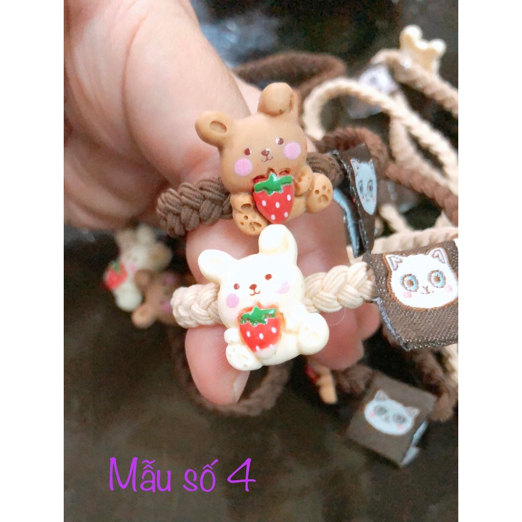 2 dây cột tóc dạng đan thắt gam màu trà sữa đính icon gấu, kitty, thỏ tím Stella Lou