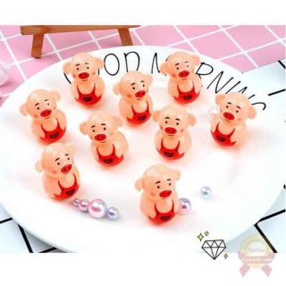 Lật đật hình heo chặn giấy