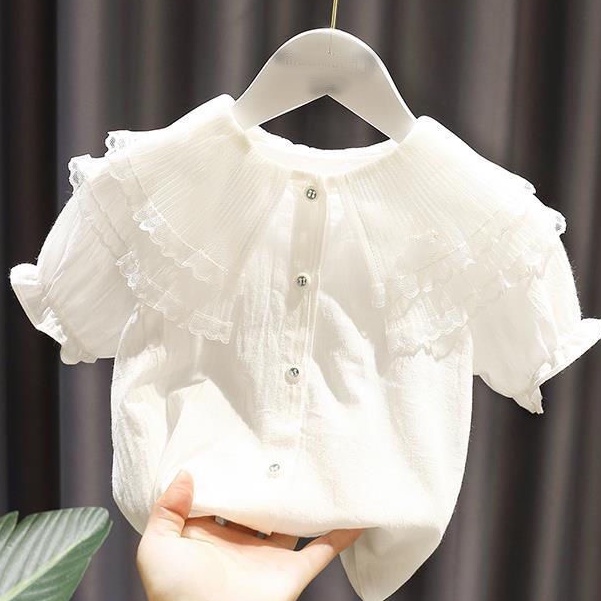 Cô gái áo sơ mi ngắn tay màu sắc ngắn tay áo sơ mi