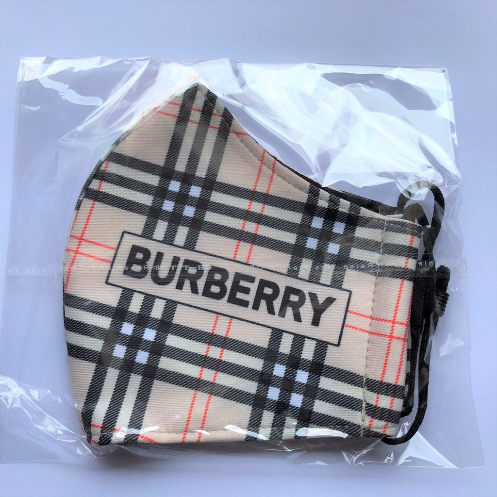 KHẨU TRANG VẢI - Burberry - Có nút tăng giảm khi đeo.