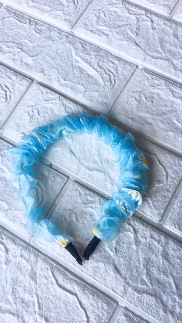 Bờm tóc hoa cúc hot trend