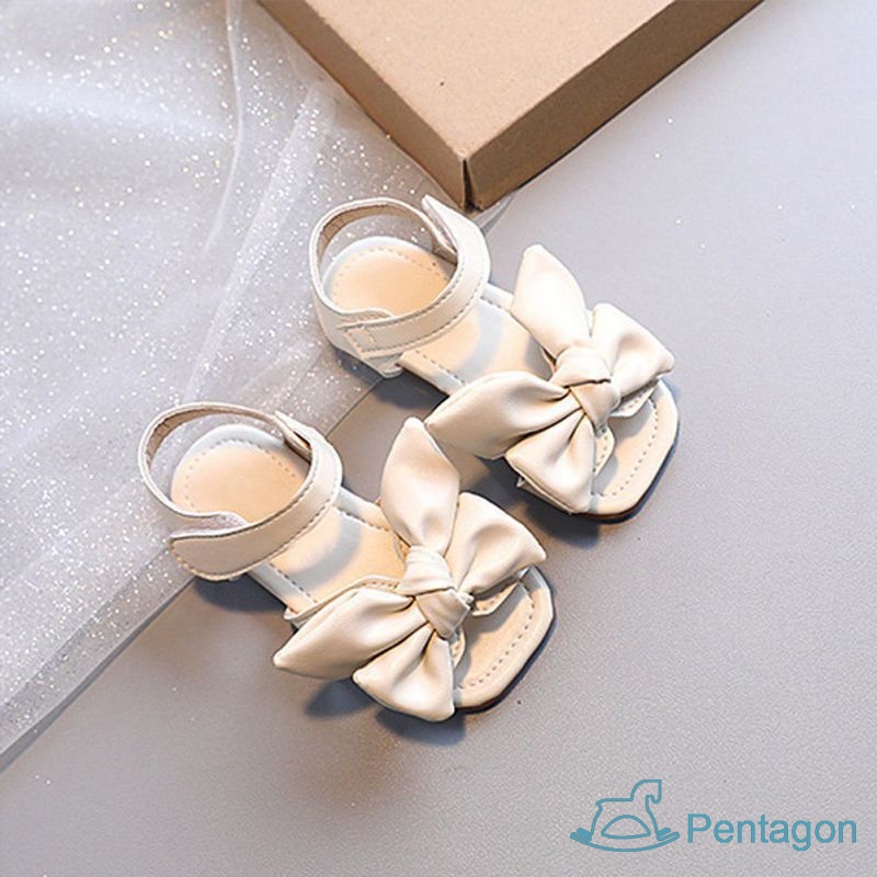 Xăng đan Đế Mềm Chống Trượt Quai Dán Đính Nơ Xinh Xắn Cho Bé Gái